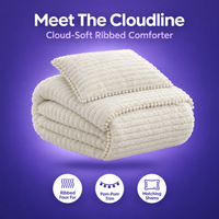 Meet the Cloudline ribbed comforter with pom-pom trim and matching shams