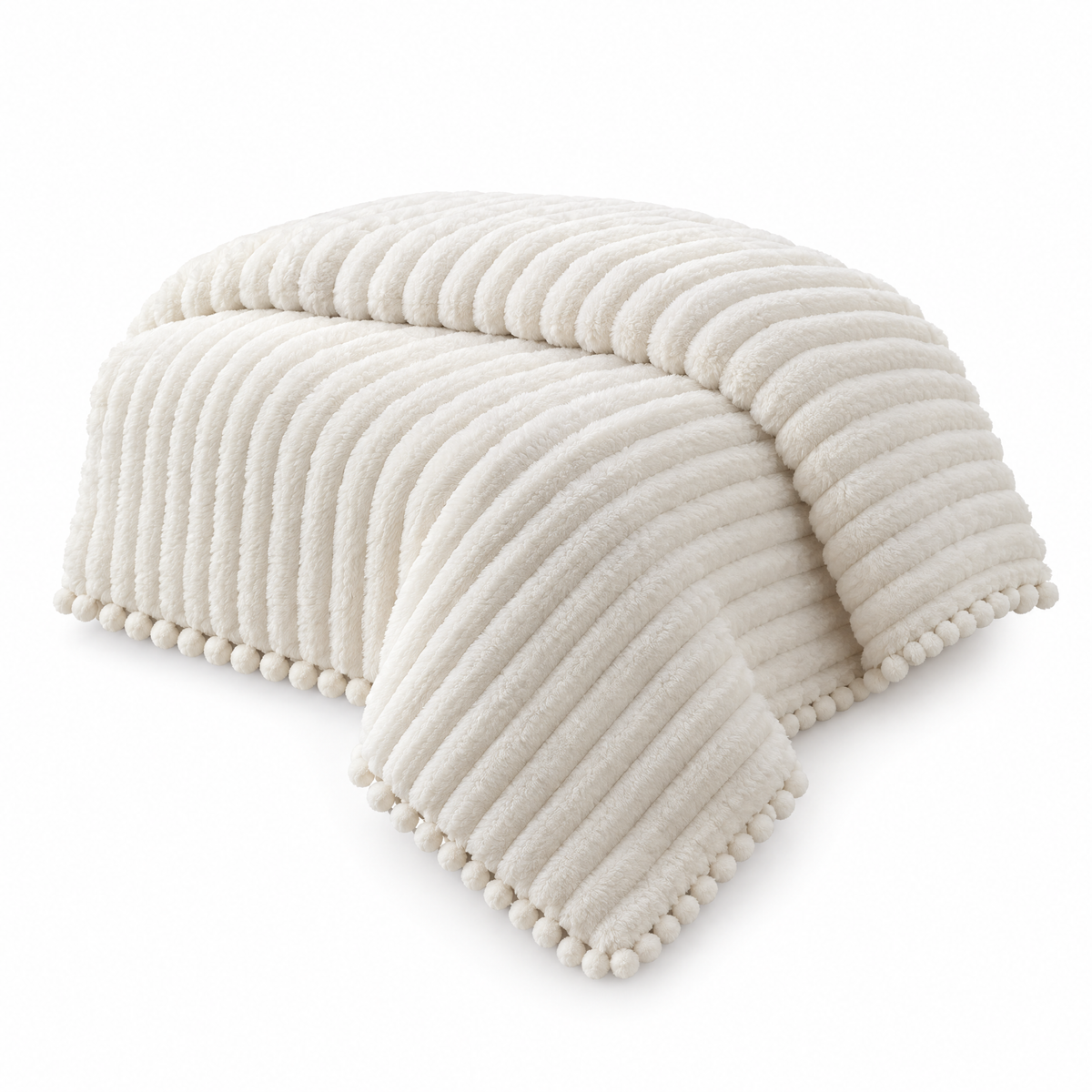 Corner of the Cloudline comforter showing ribs and pom-pom trim